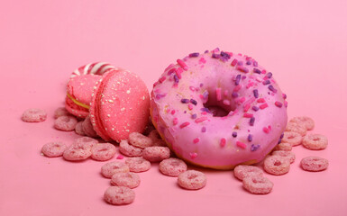 set of pink sweets on a pink background