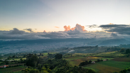 sunset in the countryside with the city of Cartago in the background with a beautiful summer sky