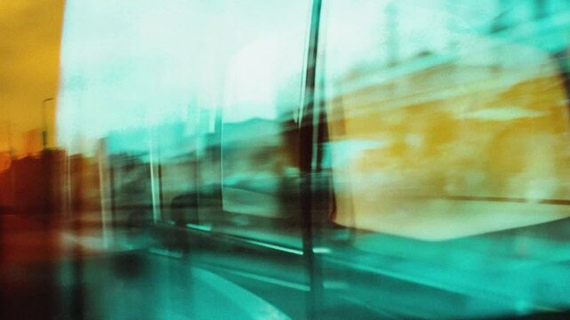 Urban fast motion point of view with long exposure city lights blurred with motion blur, traffic in the city