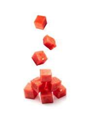 Falling Watermelon cubes isolated. Water melon cube pile, flying chopped Citrullus lanatus