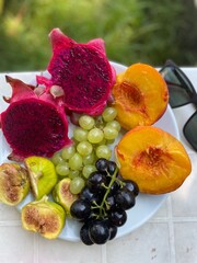 juicy fruit on a white plate