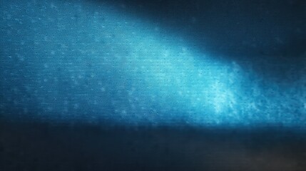 Obraz premium Blue Light Rays Shining Through Textured Surface for Art Background