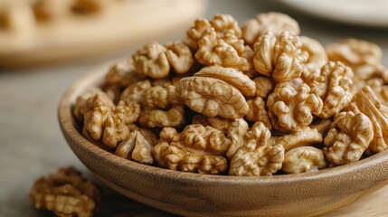 Obraz premium Nutrient-Rich Walnuts in Wooden Bowl