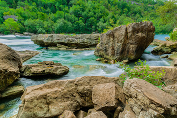 Majestic, welcoming and breathtaking view on the big rocks of the Niagara river landscape