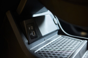 Close-up of wireless charging inside a car