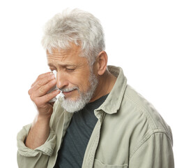 Sad senior man crying on white background