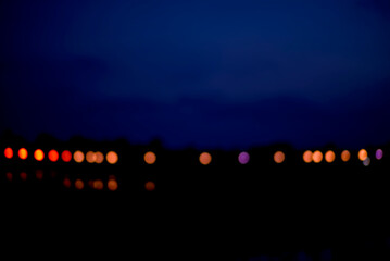 Bokeh background of the street lights  in the night out of focus