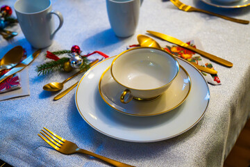 Christmas Eve table setting with elegant decorations for a festive gathering
