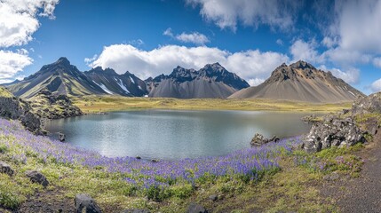 Fototapeta premium Stokksnes, Iceland landscape with beautiful nature scenery of vestron mountain range in summer with colorful blue sky and reflecting water lake surrounded. Beautiful natural landscape panorama 