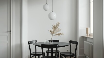 Minimalist Dining Room with Black Table and Chairs