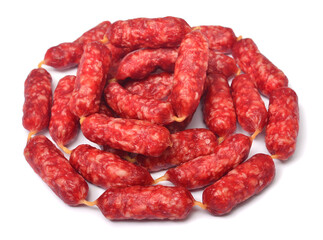 Small dry smoked sausages for beer isolated on white background