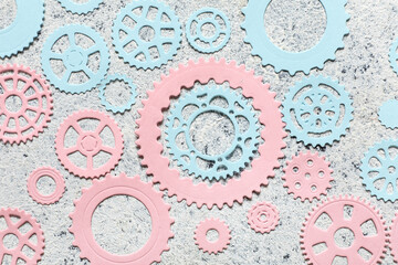Different paper gears on white background