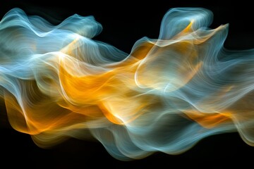 Obraz premium Abstract flowing light painting, dynamic swirls of teal and gold hues on a black background. Perfect for modern design.