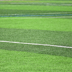 Obraz premium artificial green grass background for playground