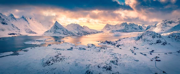 Gardinen Panoramic winter view of Norway. Fantastic morning scene of Lofoten Islands  with Fredvang bridge and Volandstind peak on background. Great seascape of Norwegian sea. Traveling concept background. © Andrew Mayovskyy