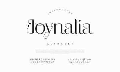 Joynalia typography beauty fashion elegant minimalist serif italic fonts decorative wedding vintage retro logos. Minimal luxury font alphabet logo. Vector illustration