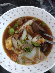 Thai food, Noodle soup with pork and boiled eggs in bowl
