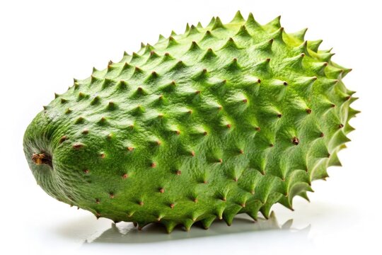 Close-up of a fresh soursop (guanabana), showcasing its vibrant green skin, creamy pulp, and visible seeds.
