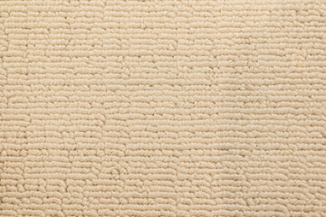 Close up of Cream colored Textured Fabric. Beige Textured Material. Textured Fabric Background.