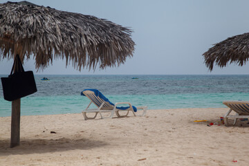 Club Amigo Atlantic resort hotel, beach umbrellasl and the caribbean shore in Guardalavaca, Cuba