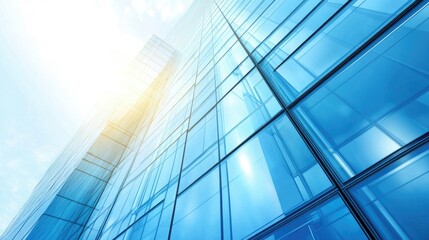 Fototapeta premium Modern Glass Building Facade Reflecting Sky and Sunlight