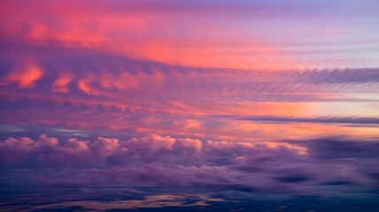 Fototapeta premium sky is filled with pink, purple, and orange hues.