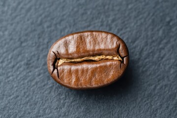 Coffee beans and roasting process. Details of freshly roasted coffee beans.