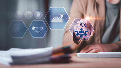 Business people planning annual tax deduction, tax rate calculation, and business financial budget,...