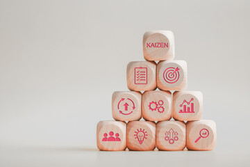 Kaizen concept. Wooden block with kaizen icon for the continuous improvement in business for...