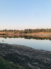 Obraz premium river sun set time images 