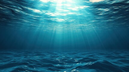 Obraz premium Dark Blue Ocean Surface Viewed from Underwater with Sunlight Filtering Through Waves Creating a Serene Aquatic Atmosphere