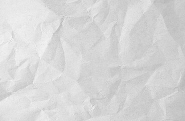 White recycled paper sheet as background with crumpled and rough pattern.