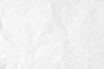 White recycled paper sheet as background with crumpled and rough pattern.