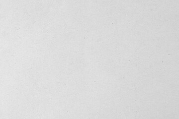Gray paper background with rough white dotted texture.