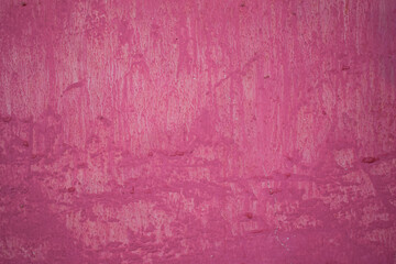 Abstract background wall with pink paint texture surface.