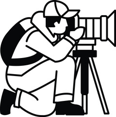 A man is crouching down and taking a picture with a camera