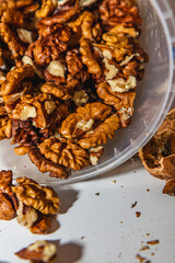 peeled walnuts on a white table close up