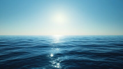 Obraz premium The ocean is calm and the sky is blue. The sun is shining on the water, creating a beautiful reflection. The scene is peaceful and serene