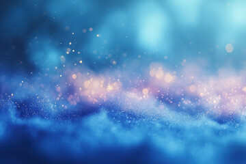 Abstract blue background with bokeh and glitter.