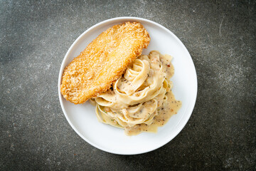 fettuccine pasta white cream sauce with fried fish