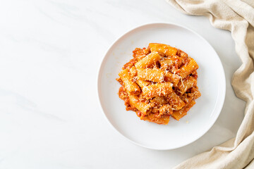 Rigatoni pasta bolognese with cheese
