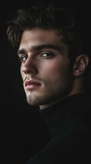Obraz premium Intense Portrait of a Young Man with Stylish Hair and Serious Expression