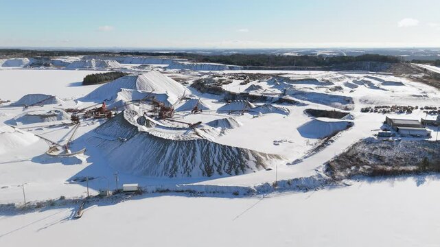 A snowy aerial view of James Dick Quarry in Caledon Village, Ontario, Canada