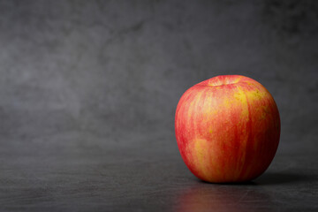 Apple close-up rendered on dark background