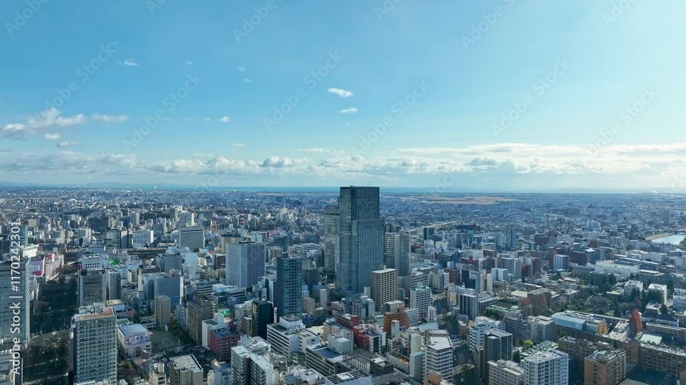 Leinwandbilder 都市、空撮、ドローン、展望、青空、パノラマ、環境、時代、現代、風景、景色、景観、俯瞰、地平線、迫力、ダイナミック、絶景、インパクト、広角、広大、ハイアングル、上から見た、見下ろす、社会、都会、建設、建築、ビル、ビル群、不動産、高層ビル、摩天楼、日本、町並み、街、観光、旅行、コピースペース、昼間、晴れ、将来、未来、天気、ビジネス、産業、下降、遠近感、60p、パース、降下