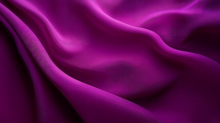 Fototapeta premium Draped purple fabric with soft folds and shadows.