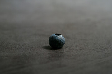 Close-up of blueberries on dark background.Fresh Blueberry Bounty. Close-up of ripe juicy blueberries filling the frame