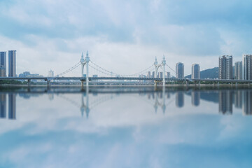 Modern urban architecture, bridges, and coastal scenery in Zhuhai, Guangdong Province, China on April 9, 2023