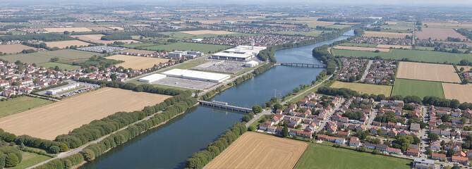 Aerial view of a peaceful countryside with a river