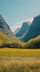 Fototapeta premium Serene Mountains Surrounded by Vibrant Green Fields and Blue Sky